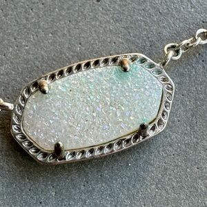 Kendra Scott Necklace. White sparkle pendant on silver chain.
